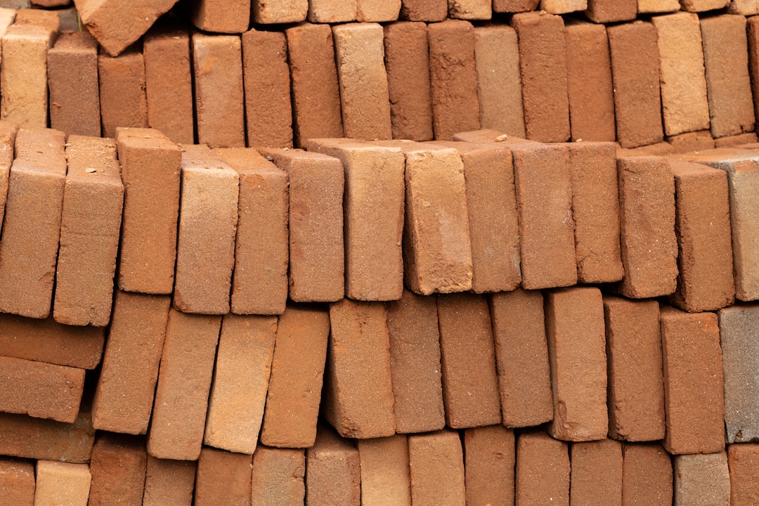 Photo by Lluvia Morales a pile of bricks sitting next to each other